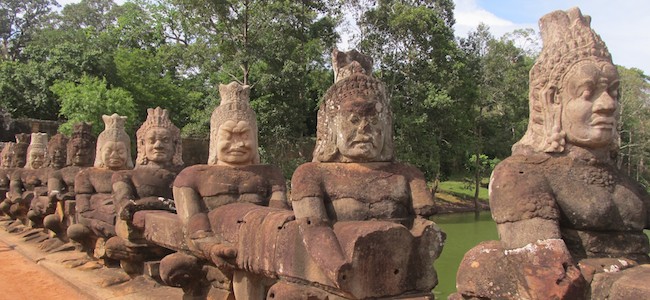 statues on a bridge at angkor wat cambodia