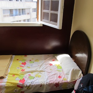 a private room with large window at dahab hostel in cairo