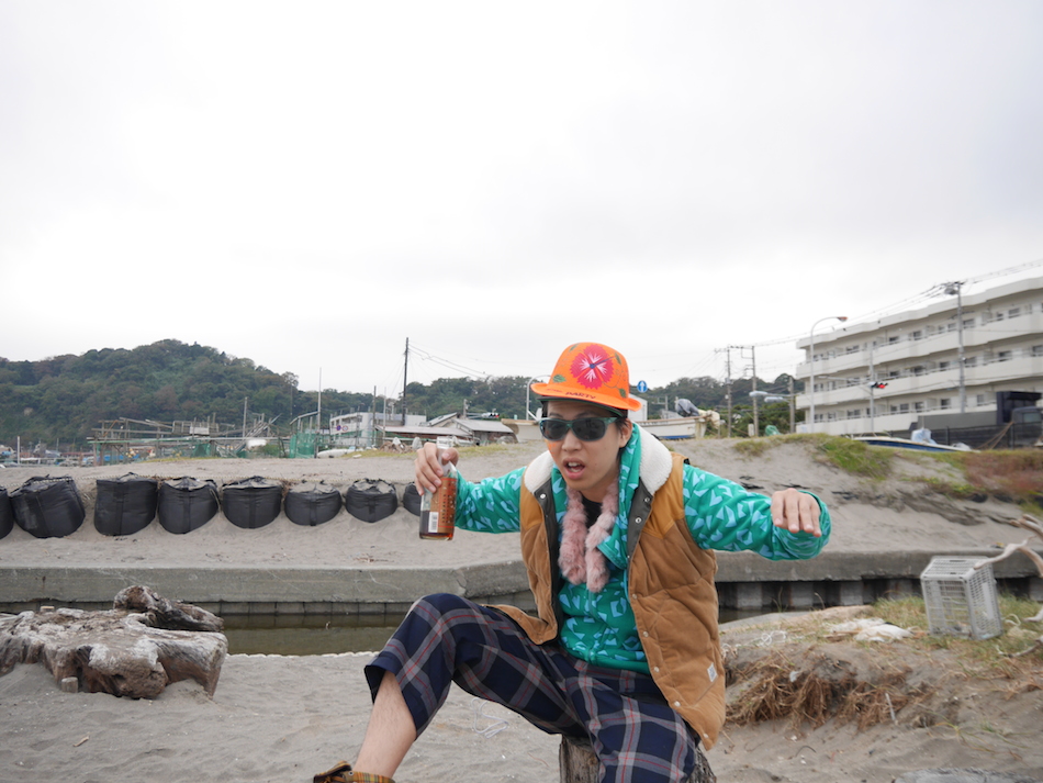 drinking on the beach in kamakura japan