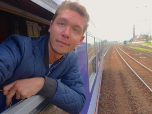 hanging out of a train in budapest